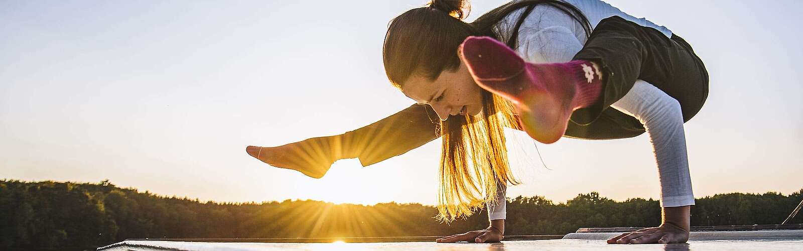 Yoga bei Sonnenaufgang